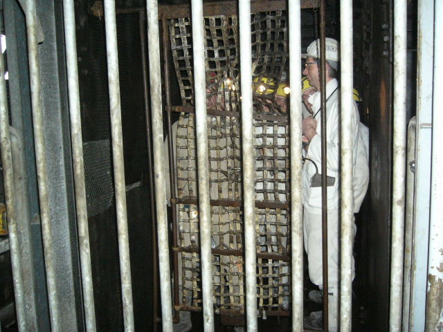 Miners in a pit cage !