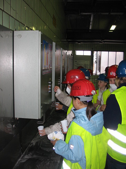 The pupils are getting something to drink at the colliery !