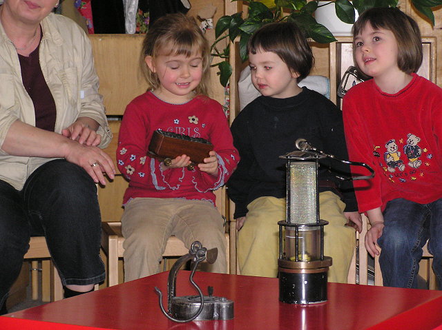 Children and old miner's lamps !